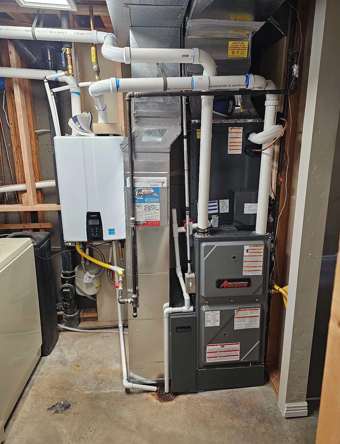 Wall-mounted tankless water heater install by AYSP