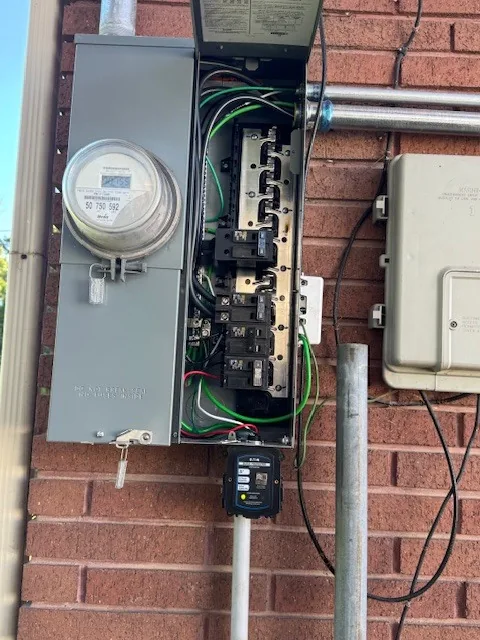 Whole-home surge protector installed at panel