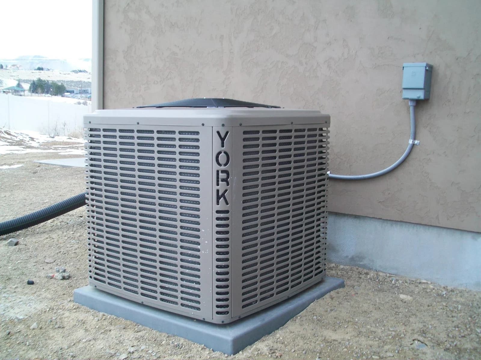 Residential AC compressor inside the outdoor condenser unit by AYSP