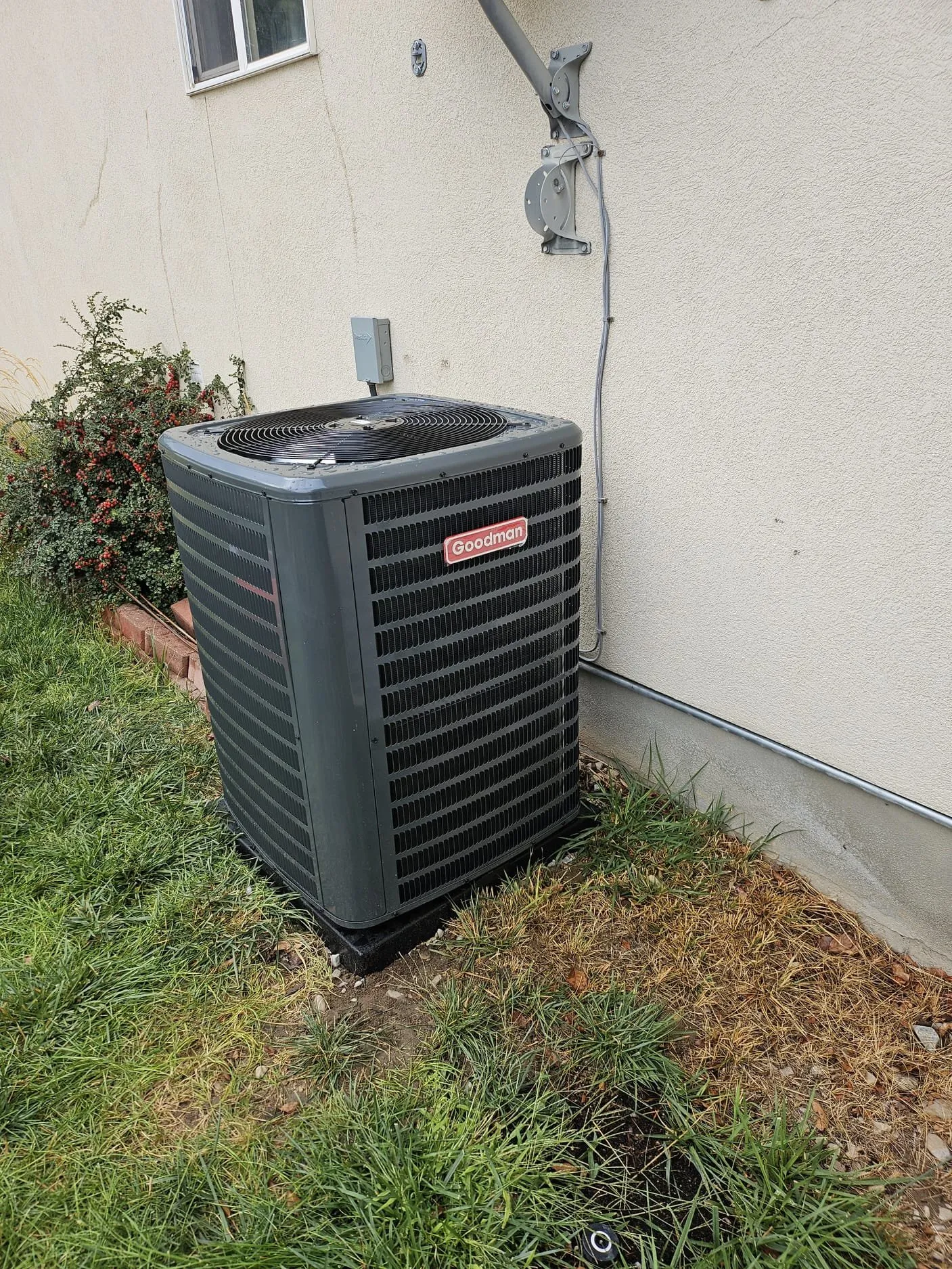 A fresh AC condenser install replacing a 15-year-old unit
