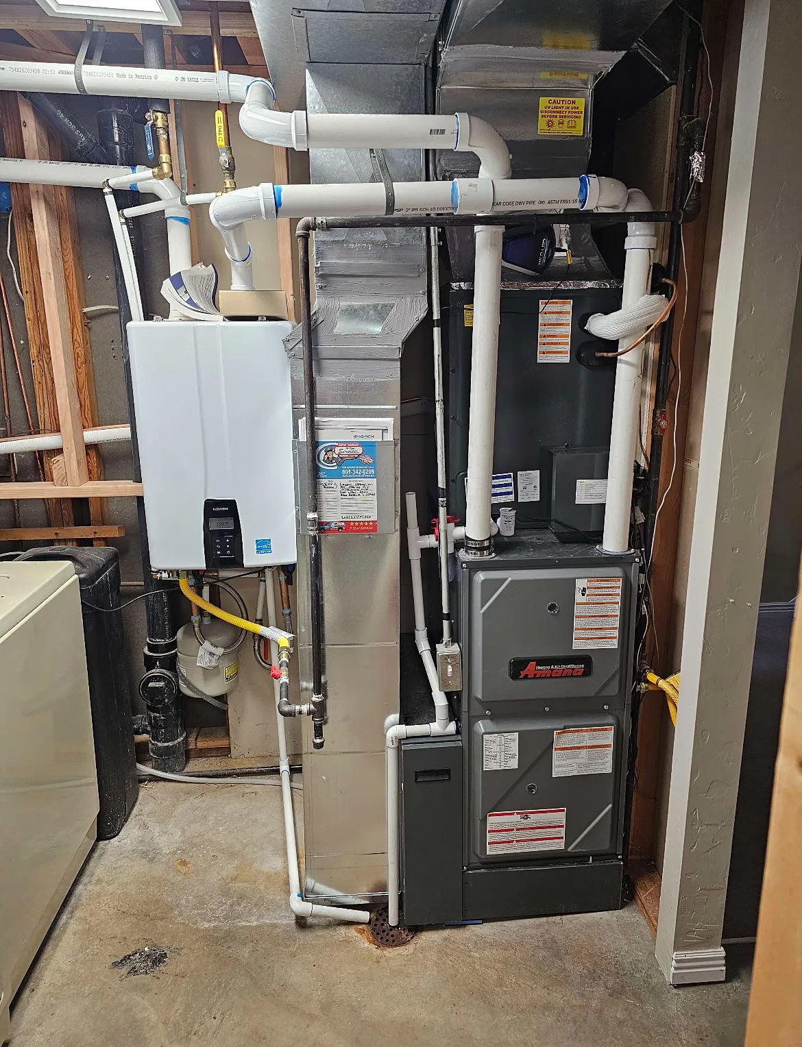 Wall-mounted tankless water heater install by AYSP