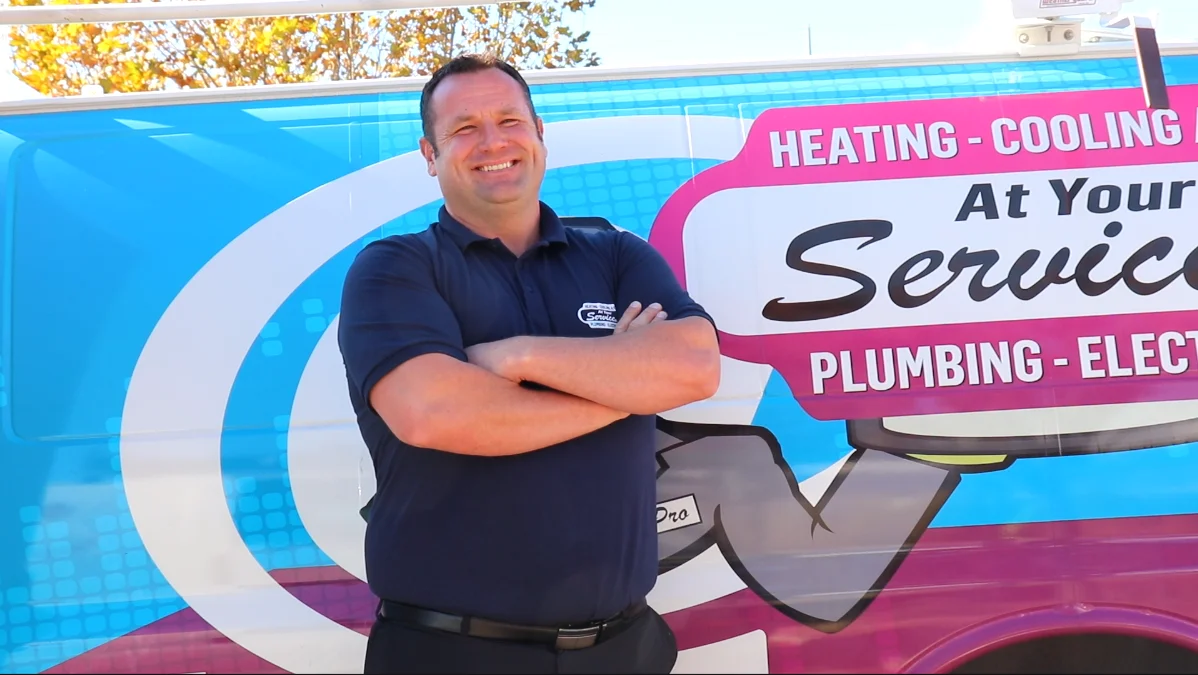 AYSP technician with branded service van